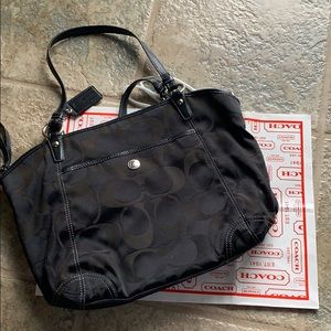 Black coach purse, blue inside